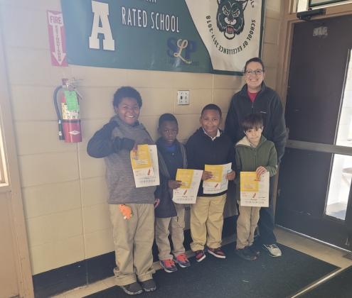 Positive Office Referrals at East Elementary included Kaddari Vories, left, Leon Jackson, Jakai Edwards and Jaxon Daire. Their principal is Gina LaGrange