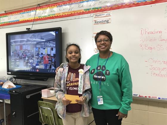 East Elementary’s fourth grade students earned 25 points award in Accelerated Reading program. Laila Jordan is with her teacher Annetta Papillion.