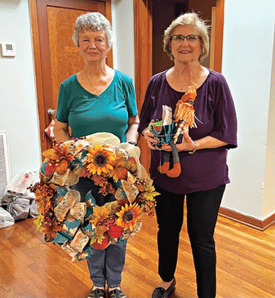 The Bulb and Blossom Garden Club held its November meeting at the First Methodist Church Fellowship Hall. The program for the month was “Floral Designs-Wreaths for the Holidays” and  was presented by member Erin Jones. Jones explained the basics of creating a wreath, as well as general rules of thumb when considering items to use to enhance the wreath, like pinecones or dried flowers, the placement of bows on the wreath and colors.  Members then tried their hand at creating their own wreaths with items brou
