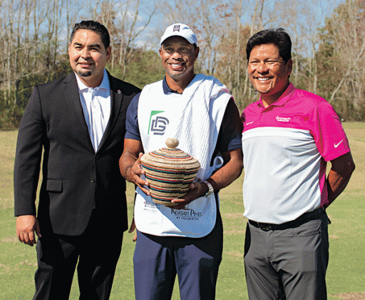 From left, are Coushatta Tribal Chairman Jonathan Cerne, Tiger Woods and Notah Begay III Jr. Cernek presents Tiger Woods with the Coushatta traditional pine needle basket. (Submitted photo)