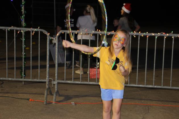 Ellie Lyons plays with a Hoola Hoop