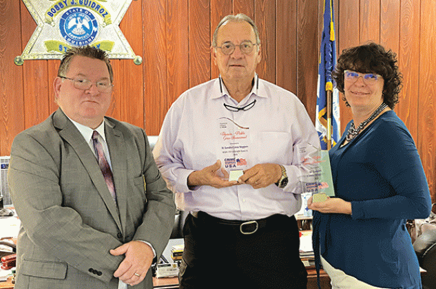 From left, St.Landry Parish Sheriff’s Deputy Chief Eddie Thibodeaux, Sheriff Bobby Guidroz and St. Landry Crime Stoppers administration assistant, Sgt Elizabeth Bernard. Thibodeaux is director of Crime Stoppers. (Submitted photo)