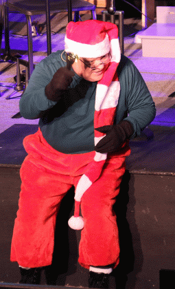 unice’s Bob often appears suddenly in the midst of the band, choir and audience for a comic bit. After the summer concert Bob, also known as Van Reed, said he was considering dropping the concert elf routine. Who would have guessed that deep into the Maine woods there would be a suggestion that “Bob” might be around. So, if Bob doesn’t show up at the next concert there is a clue in the woods to his whereabouts.