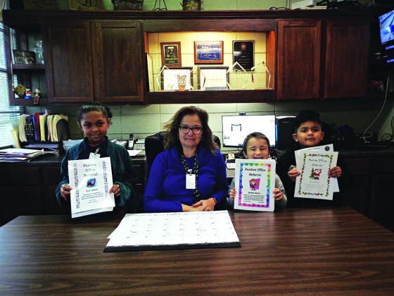 Glendale Elementary students were nominated by teachers for their excellent behavior and for following the schools 3B rules and then were rewarded as Positive Office Referrals. From left, are Nyla Vallaire, Laura Lombas, principal; Bentley Barton and Bryan Ramirez. (Submitted photo)