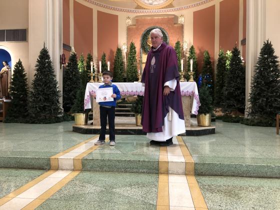 Slade Miller, first grader at St. Edmund Elementary, completed 24 quests in Amplify Reading.