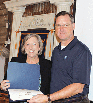 Jerrie LeDoux, congressional aide to Congressman Mike Johnson, was at the Eunice Rotary Club meeting Wednesday to present a Certificate of Congressional Recognition to Dwight Jodon for his achievement and accomplishment  of composing and writing the lyrics to LSUE’s fight song and alma mater. (Photo by Myra Miller)