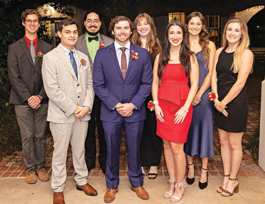 The University of Louisiana at Lafayette’s Fall 2021 Outstanding Graduates are, from left: Wade Johnson, College of Liberal Arts; Jase Mayorga, College of Engineering; Noe Fernandez, University College; Overall Outstanding Graduate Tyler Francis, B.I. Moody III College of Business Administration; Grace Marks, College of the Arts; Taylor Montoucet, College of Nursing and Allied Health Professions; Bailey Austin, College of Education; and Sydney Boudreaux, Ray P. Authement College of Sciences. (Photo by Rache