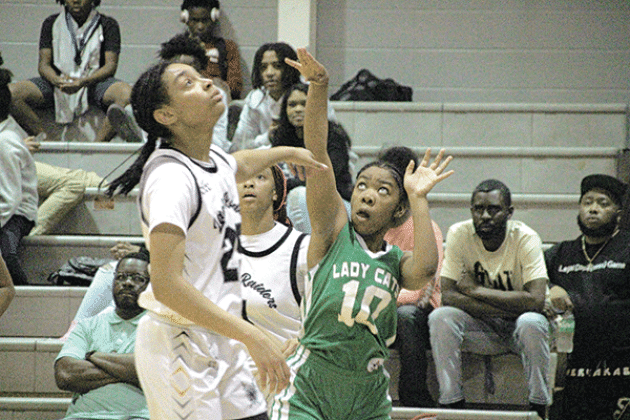 By Rhett Manuel Sports Editor It was a tough night for Eunice basketball in the opening night of the St. Landry Parish Tournament, as both the girls and boys teams suffered losses and moved into the loser’s brackets in their individual fields. Northwest 50, Lady Cats 20 Eunice High School’s girls’ basketball team suffered a tough loss to the Northwest Lady Raiders on Tuesday night, falling by a score of 50-20. The Lady Cats started the game strong, tying the score at 5-5 after Simone Laws knocked down a sho