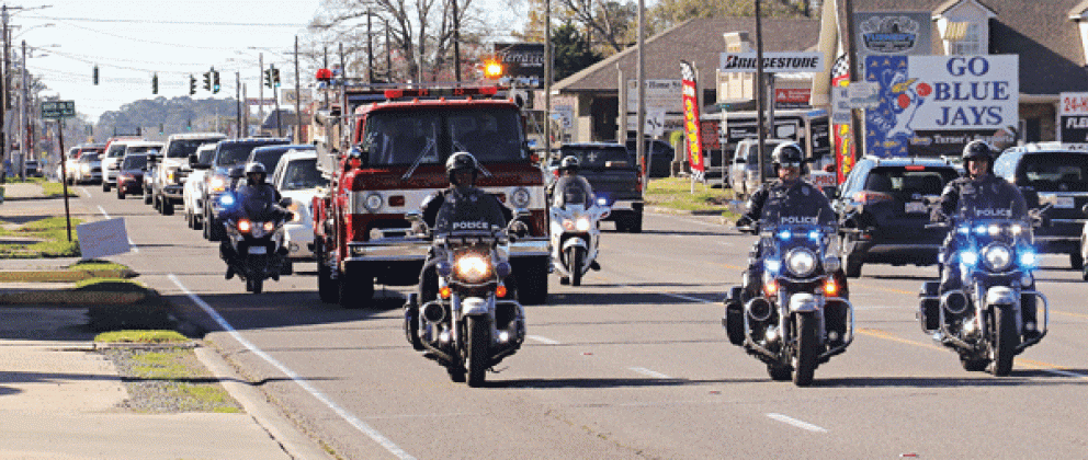 The funeral procession on U.S. 190 for former police chief Gary "Goose" Fontenot.