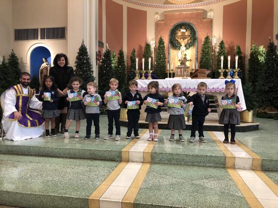 Stacy Moncla’s Pre-K3 students at St. Edmund Elementary were  recognized at Mass and awarded a certificate for learning to make the “Sign of the Cross” correctly,  and  to pray the “Blessing before Meals.”