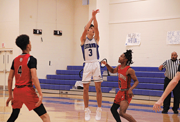St. Ed’s John Landry fires up a shot during the Brad and Kendall Fontenot Memorial Shootout.