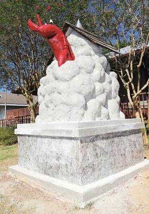 The Clovis Crawfish statue in front of The Eunice Depot Museum. A Clovis Crawfish 61st birthday party is planned there on April 9. (Photo by Harlan Kirgan)