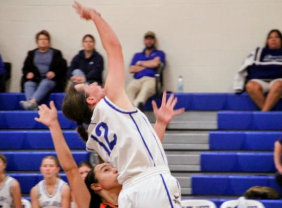 No. 12 Lady Jays basketball player Caroline Lavergne makes a play.