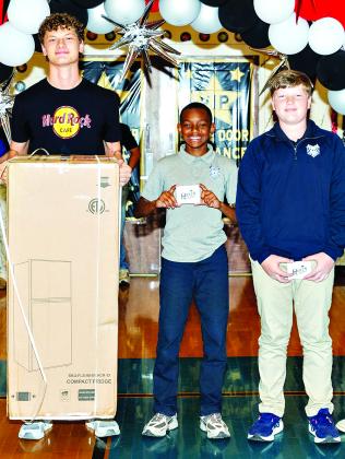 Students of the Year were recognized during the St. Edmund High Academic Pep Rally. From left are Dane Fontenot, Twelfth Grade Student of the Year; Keith Reed, Fifth Grade Student of the Year; and Rhett Wimberly Eighth Grade Student of the Year.