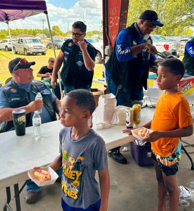 Kids in line getting food