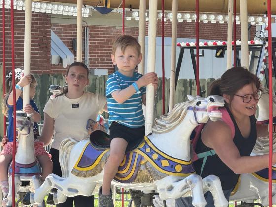 A fun carousel ride at St. Edmund Spring Fair.