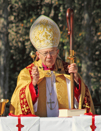 Bishop J. Douglas Deshotel of the Diocese of Lafayette blesses the three copies of the Acts of the Cause for the canonization of Charlene Marie Richard, “The Little Cajun Saint,” during a ceremony at St. Edward Church in Richard on Saturday. Two of the three copies will be delivered by hand to the Dicastery for the Causes of Saints directly across from Saint Peter’s Basilica in Rome, and the original will remain sealed in the archives of the Diocese of Lafayette. (Photo by Claudette Olivier/Crowley Post-Si