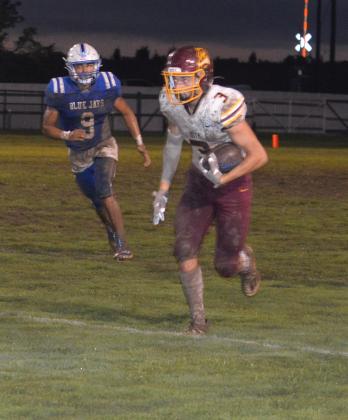 Iota's Luke Duhon scores on an interception return.