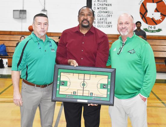 Eunice High honored long-time Bobcats’ basketball coach Robert Trent in a ceremony to place his name on the court. From left, are EHS principal Mitch Fontenot, Trent and athletic director Scott Phillips. (Photo by Tom Dodge)