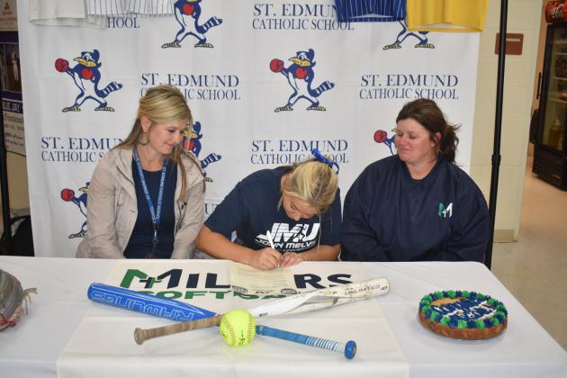 Nicole Evans signs with John Melvin University.