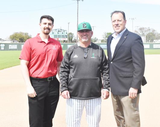 From left, are Caleb Taylor, EHS head coach Scott Phillips and Kip Bertrand. Washington State Bank is the tournament sponsor.