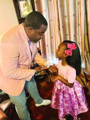Dr. Perry Fontenot III and his daughter Kharis
