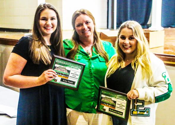 Misty Guillory, center, joins senior athletic trainers Kiley Tauzin and McKenzie Smith.