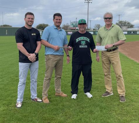 From left are Stefan Frey, Cole Frey, Eunice High head baseball coach Scott Phillips and Randy Young.
