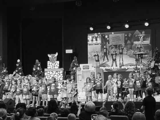 Kids on stage singing