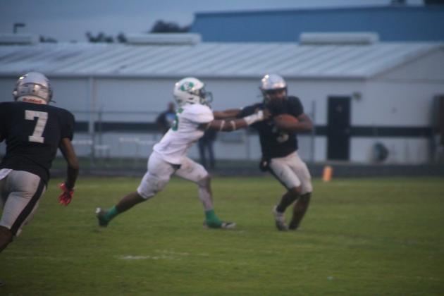 Eunice linebacker Zyon Fontenot attempts to drag down a Northwest ball carrier during Friday's 21-14 loss.