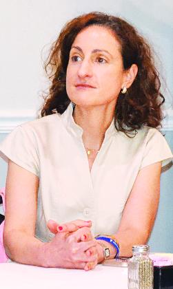 Dr. Tina Stefanski, Region 4 Office of Public Health Medical Director, listens to a question during Tuesday’s Crowley Lions Club meeting. (Photo by Steve Bandy/Crowley Post-Signal)
