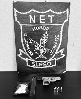 Narcotics and weapons confiscated from Monkurivs James Irvin