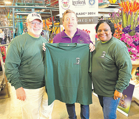 Surrounded by hundreds of volunteers and thousands of flowers, Jerry and Denise Underwood spent their New Year’s Day weekend volunteering their time and talents assisting in decorating the State of Louisiana’s award winning entry in the 2024 Rose Bowl Parade. Here, they present Lt. Governor Billy Nungesser with a City of Rayne shirt when they arrived in Pasadena, California.