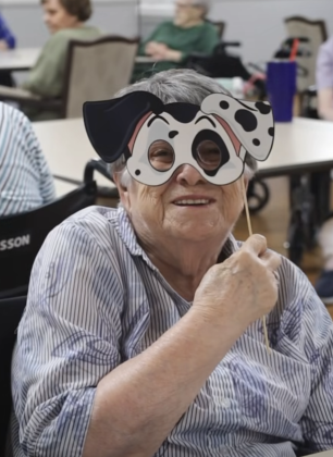 Puppy mask with smiling woman