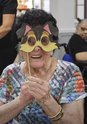 Puppy mask with smiling woman