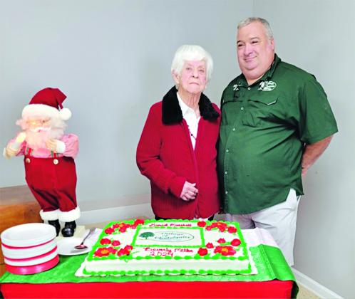Beverly  Miller, the grand marshal of the Chataignier Christmas Parade, is pictured on the left with Chataignier Mayor Justin Darbonne. (Photo courtesy of Anna Mosbroker)