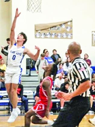 No. 0 Blue Jays basketball player Owen Cart makes plays. Cart is a senior.