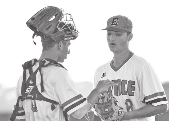 Eunice High catcher Zac Suire, left, talke with Bobcat pitcher Hudson Manuel during a timeout at Monday’s first round playoff gams against Northwood-Shreveport.