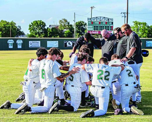 Prayer led before the Eunice High Bobcats game. (Photo by Dwight Jodon)