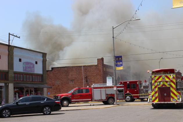 Firefighter working a major fire at Nick's on 2nd