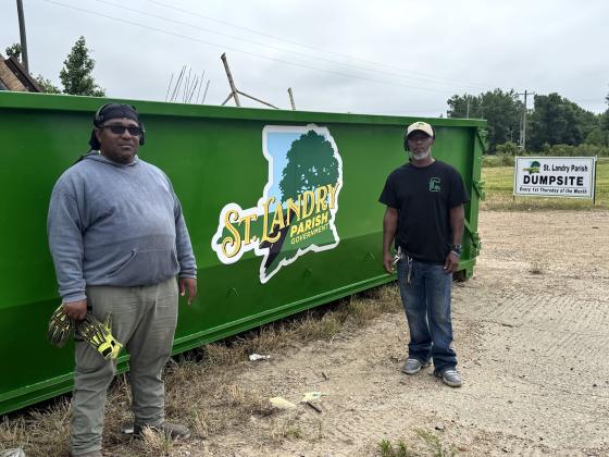 St. Landry Parish Government Public Works employees Jeremiah Champ and Chris Carrier manned the station today to make sure operations went smoothly. (Photos by Rebecca Chaisson)