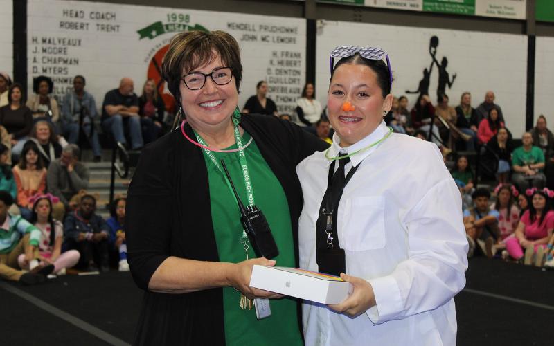 There were three different drawings during the Renaissance Pep Rally and the grandest and biggest prize was drawn at the conclusion of the program. Winning the grand prize of an Apple iPad was Camryn Gradney, a junior. She is pictured with Principal Irma Trosclair.
