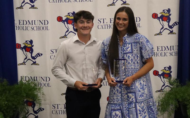 St. Edmund High students Lannie Reed and Aubrie LeJeune received the “Tom Dodge Christian Character Award.” (Photo by Amy Myers)