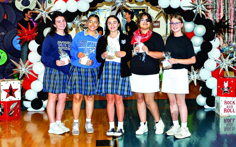 Young Christian Girls at St. Edmund High were honored. From left are Ninth grader Tiana Orlando, Tenth grader  Isabella Arnaud, Eleventh grader Journey Semien, and Twelfth grader Katy Miller and Caroline Fontenot.