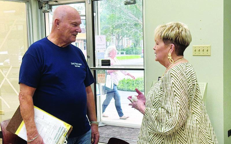 Tony Baltakis and Deanne "Dee" Daigle at library
