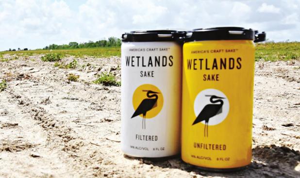 Wetlands Sake cans stand on the 31-acre field planted with short-grain rice that will be used to make the beverage. (Photo by Bruce Schultz/LSU AgCenter)