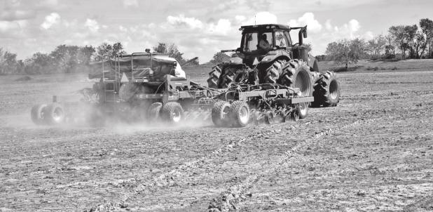 A field near Gueydan in Vermilion Parish is planted with a seed drill last week. Rice planting in south Louisiana was almost completed before this week’s heavy rains, but north Louisiana planting has been delayed by wet weather that has kept farmers out of the fields. (Photo by Bruce Schultz/LSU AgCenter)