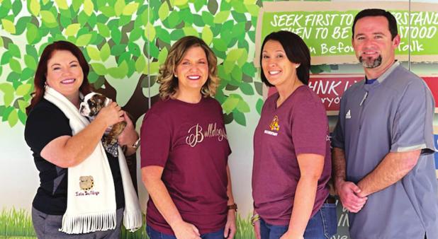From left, are Shawn LeJeune, principal, Shelley Frey, Alisha Thibodeaux, and Stephen Broussard, assistant principal.