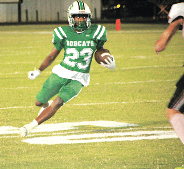 Bobcat running back Malik Thomas looks for running room against Welsh. (Photo by Rhett Manuel)
