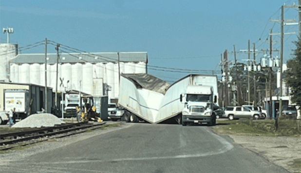 An 18-wheeler was coming out onto South East near G&H Seed when the trailer failed at 2:15 p.m. Friday. According to Eunice Police Chief Kyle LeBouef, “No one was injured, and apparently the trailer collapsed. It was apparently overloaded. No report was done.” (Submitted photo)